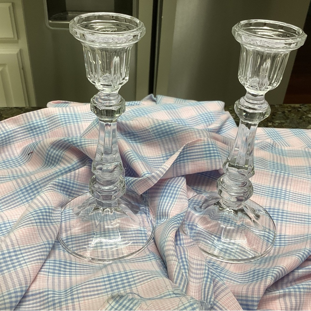 A pair of vintage crystal candlesticks to decorate your home.